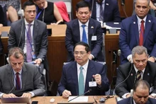 Le Premier ministre Pham Minh Chinh prend la parole lors du Sommet sur l’ambition climatique. Photo: VNA