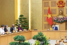 Le Premier ministre Pham Minh Chinh reçoit la coordonnatrice résidente de l’ONU au Vietnam, Pauline Tamesis, et les représentants en chef des organes onusiens. Photo : VNA.