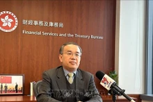 Le directeur des Services financiers et du Trésor de Hong Kong (Chine), Christopher Hui. Photo : VNA.