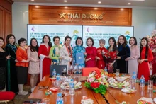 Le Club du Patrimoine de l'ao dài vietnamien en Chine a été créé dans une ambiance enthousiaste en ce début de nouvelle année. Photo : nhandan.vn
