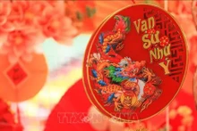 L'image du dragon sur un objet de décoration. Photo d'illustration : VNA.