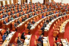 Les délégués au 8e Plénum du Parti. Photo: VNA