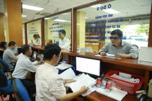 A l'office des impôts de Hanoï. Photo : VNA