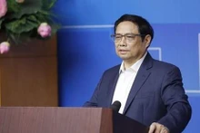 Le Premier ministre Pham Minh Chinh lors de la conférence urbaine nationale 2022. Photo : VNA.