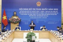 Le Premier ministre Pham Minh Chinh préside la Conférence urbaine nationale 2022. Photo : VNA.