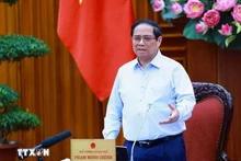 Le Premier ministre Pham Minh Chinh assume la direction du Comité de pilotage des centres financiers régional et international du Vietnam. Photo : VNA.