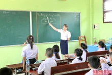 Dans un cours du vietnamien à l'école bilingue vietnamo-lao Nguyen Du à Vientiane, capitale du Laos.