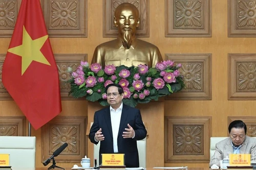 Le Premier ministre Pham Minh Chinh préside la réunion sur la « campagne Quang Trung ». Photo : NDEL.