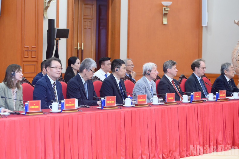 Photo: nhandan.vnLes délégués participant à la réception. 8.jpg