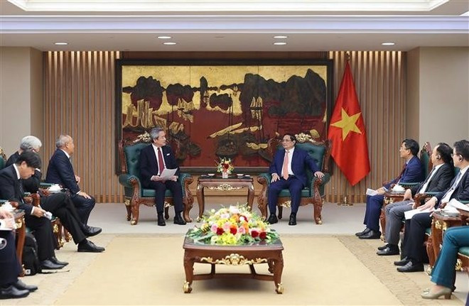 Le Premier ministre Pham Minh Chinh recevant le PDG de Marubeni Corporation, Masayuki Omoto, à Hanoi, le 14 juillet. Photo : VNA Le Premier ministre Pham Minh Chinh recevant le PDG de Marubeni Corporation, Masayuki Omoto, à Hanoi, le 14 juillet. Photo : VNA