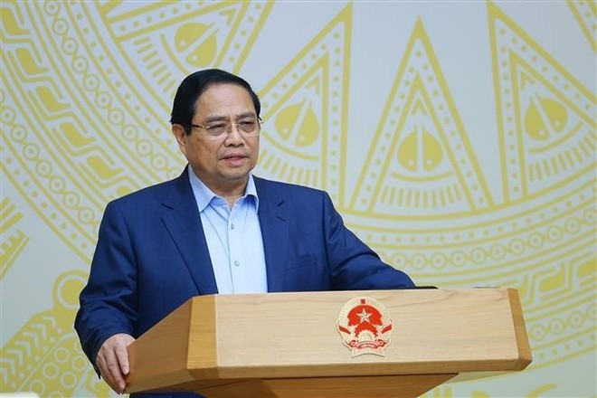 Le Premier ministre Pham Minh Chinh prend la parole lors de la réunion. Photo : VNA