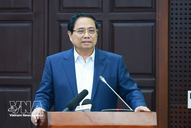 Le Premier ministre Pham Minh Chinh prend la parole lors de la séance de travail. (Photo : VNA)
