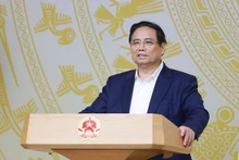 Le Premier ministre s'exprime lors de la conférence. Photo : VNA.