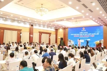 Forum « Technologies d’identification et traçabilité - élever la valeur des produits vietnamiens ». Photo : congthuong.vn