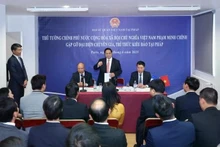 Le Premier ministre Pham Minh Chinh rencontre à Paris des représentants d'experts et d'intellectuels vietnamiens en France. Photo : VNA.