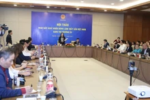 Lors du colloque intitulé « Promouvoir les exportations vietnamiennes de produits agricoles, sylvicoles et aquatiques vers le marché de l’UE », organisé le 13 novembre à Hanoï. Photo : baoquocte.vn