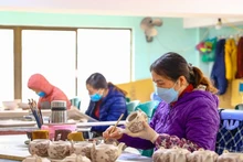 Les villages de métiers de Hanoï en pleine effervescence à l’approche du Têt. Photo . VNA. ​