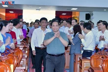 Le Premier ministre Pham Minh Chinh lors de la rencontre. Photo : VOV.