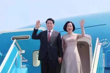 Le président de la République, Luong Cuong et son épouse. Photo: VNA