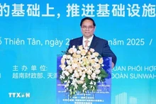 Le Premier ministre Pham Minh Chinh s’exprime lors du Forum de connexion d'affaires Vietnam–Chine à Tianjin. Photo : VNA.