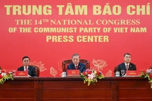 Le secrétaire général du Parti To Lam (centre) lors de la conférence de presse internationale sur les résultats du XIVe Congrès national du Parti, à Hanoï, le 23 janvier. Photo : Dang Khoa.