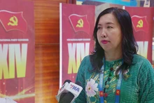 La vice-ministre des Affaires étrangères, Le Thi Thu Hang répond à presse, en marge du XIVᵉ Congrès national du Parti. Photo: VNA.