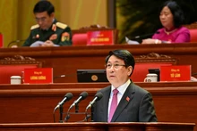 Le président de la République, Luong Cuong, prononce le discours d’ouverture du XIVᵉ Congrès national du Parti communiste du Vietnam. Photo : Nhandan.vn