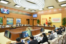 Vue d'ensemble de la conférence, à Hanoï, le 26 février. Photo : NDEL.