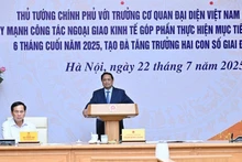 Le Premier ministre Pham Minh Chinh s'exprime lors de la conférence. Photo : NDEL.