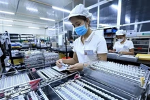 L'adoption de l'IMM permet au Vietnam de conserver les investisseurs et de concrétiser son objectif d'améliorer la qualité des flux de capitaux à l'avenir. Photo : VNA.