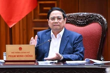 Le Premier ministre Pham Minh Chinh s'exprime lors de la séance de travail. Photo : NDEL.