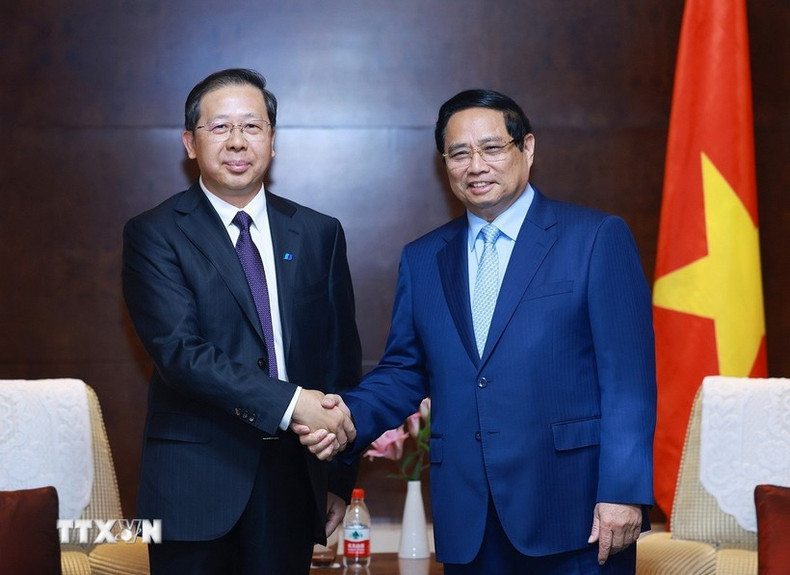 Lors de la rencontre avec le Groupe de conception Huatie (CHEC). Photo : VNA. thu-tuong-tiep-mot-so-lanh-dao-tap-doan-hang-dau-cua-trung-quoc-1.jpg