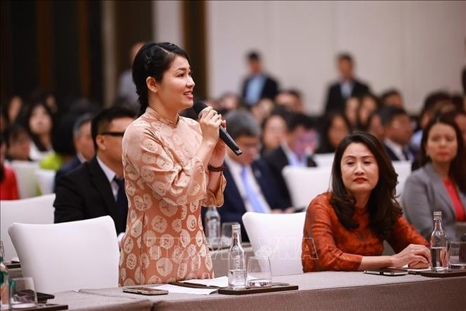 Dô Hông Hanh, une représentants de la communauté vietnamienne en Chine, s’exprime lors de l’événement, à Tianjin, le 25 juin. Photo : VNA. Dô Hông Hanh, une représentants de la communauté vietnamienne en Chine, s’exprime lors de l’événement, à Tianjin, le 25 juin. Photo : VNA.