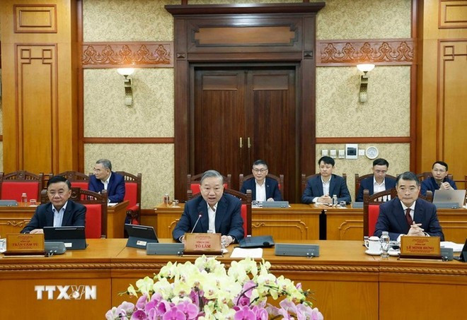 Lors de la réunion. Photo : VNA