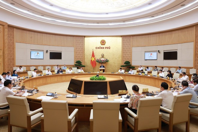 Vue d’ensemble de la réunion pour évaluer les résultats du fonctionnement du modèle d’administration locale à deux niveaux. Photo : VNA Vue d’ensemble de la réunion pour évaluer les résultats du fonctionnement du modèle d’administration locale à deux niveaux. Photo : VNA
