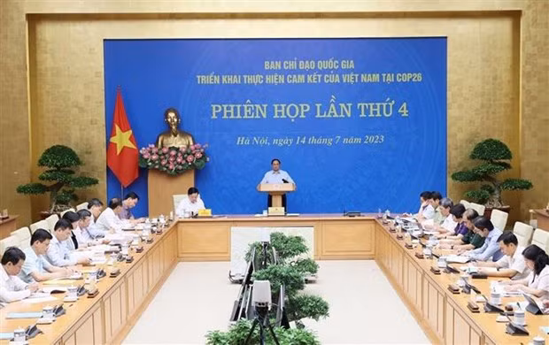 Le Premier ministre Pham Minh Chinh s’exprimant lors de la 4e réunion du Comité de pilotage national pour la mise en œuvre des engagements du Vietnam lors de la COP26, à Hanoi, le 14 juillet. Photo: VNA