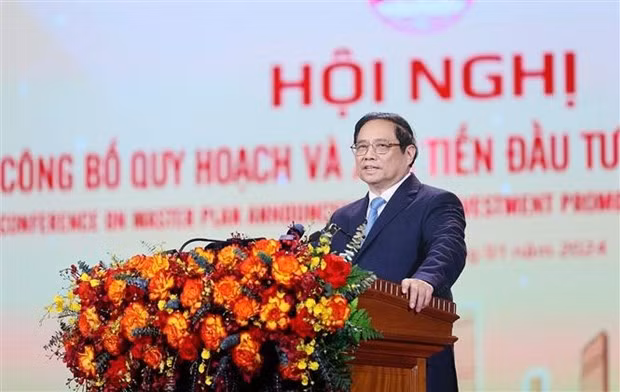 Le Premier ministre Pham Minh Chinh s'adresse à la conférence sur l’annonce du plan directeur et la promotion des investissements de la province de Hai Duong. Photo : VNA. 