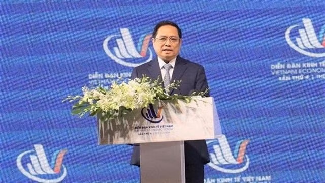 Le Premier ministre Pham Minh Chinh s'exprime lors du 4e Forum économique du Vietnam 2022 à Hô Chi Minh-Ville. Photo : nhandan.vn