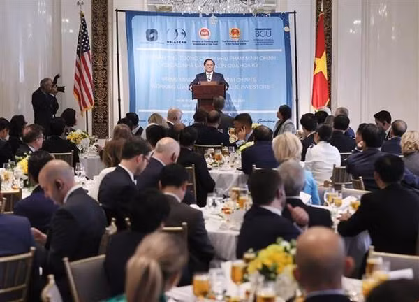 Le Premier ministre Pham Minh Chinh travaille avec la communauté des entreprises américaines. Photo : VNA