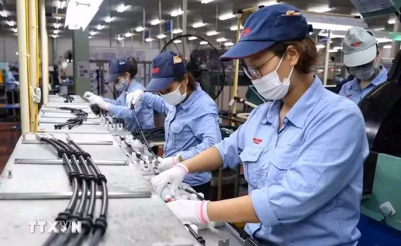 Dans l'usine de la SARL Nichirin Vietnam, à capital 100% japonais, à Bac Giang. Photo : VNA.