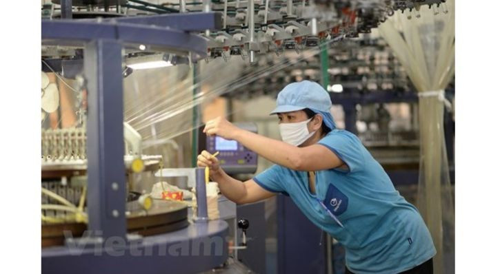 La production industrielle reprend. Photo : VNA.