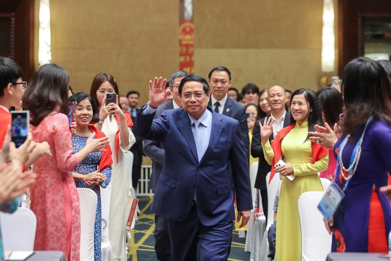 Le Premier ministre Pham Minh Chinh a rencontré des représentants de la communauté vietnamienne en Chine le 31 août. Photo : VGP.