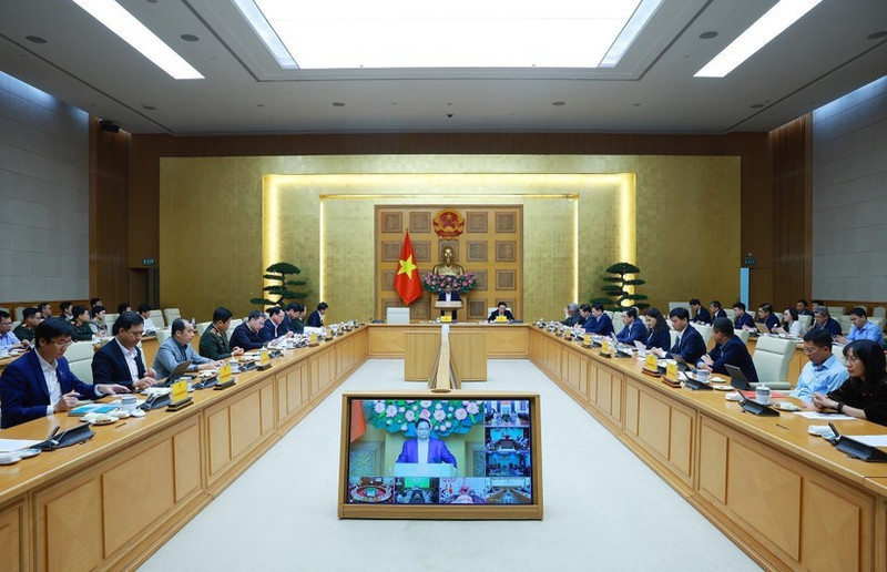 Le Premier ministre Pham Minh Chinh préside la visioconférence pour évaluer l'avancement de la « Campagne Quang Trung ». Photo : VNA.