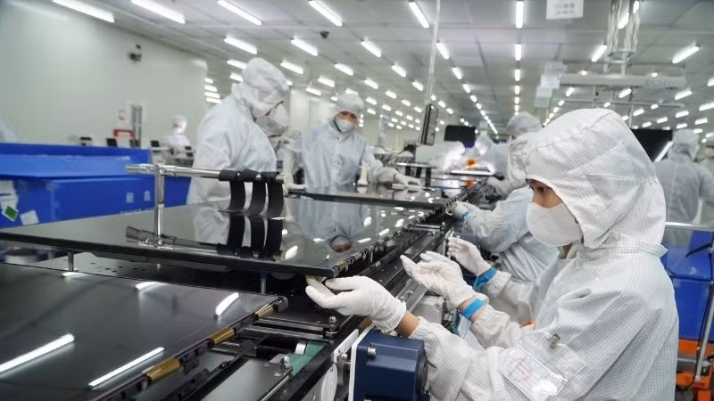 Production à la société à responsabilité limitée Coretronic Vietnam High Technology, l’un des projets de haute technologie de la ville de Ho Chi Minh-Ville. Photo : NDEL.