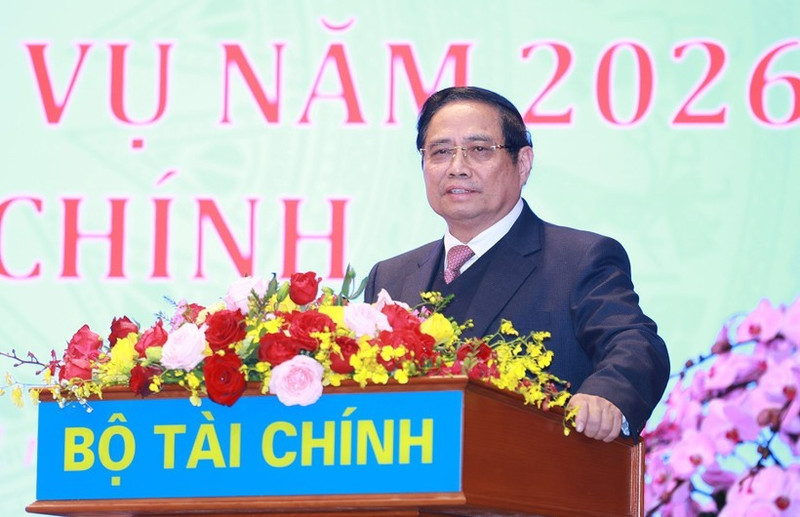 Le Premier ministre Pham Minh Chinh prend la parole lors de la conférence. Photo : VNA