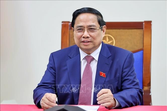 Le Premier ministre vietnamien Pham Minh Chinh s&#39;entretient par téléphone avec Alexeï Likhatchev, directeur général de Rosatom. Photo : VNA.