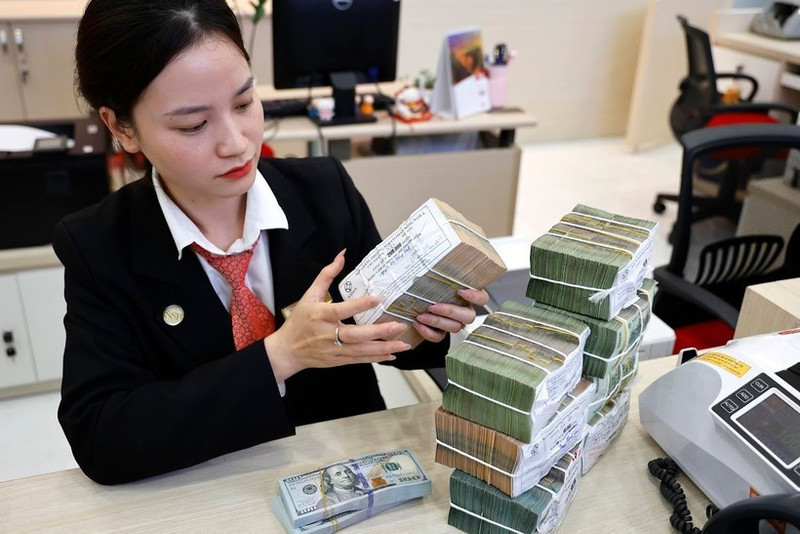 Les banques mettent en œuvre diverses solutions pour soutenir les entreprises. Photo : Vietnam+