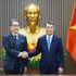 Le Premier ministre Le Minh Hung (droite) et le gouverneur de la Banque japonaise pour la coopération internationale (JBIC), Maeda Tadashi. Photo : VNA.