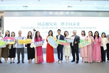 Lors de la cérémonie de lancement du programme d’échange médiatique Vietnam – Chine, le 4 août dans la ville de Nanning, province du Guangxi (Chine). Photo : baoquocte.vn
