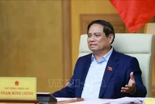 Le Premier ministre Pham Minh Chinh s'exprime lors de la réunion. Photo : VNA. 